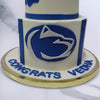 The bottom of the graduation theme cake for him / her , we've created a two-dimensional logo of the school right in the middle of two blue pillars. This graduation cake with school logo is perfect to celebrate a milestone of life