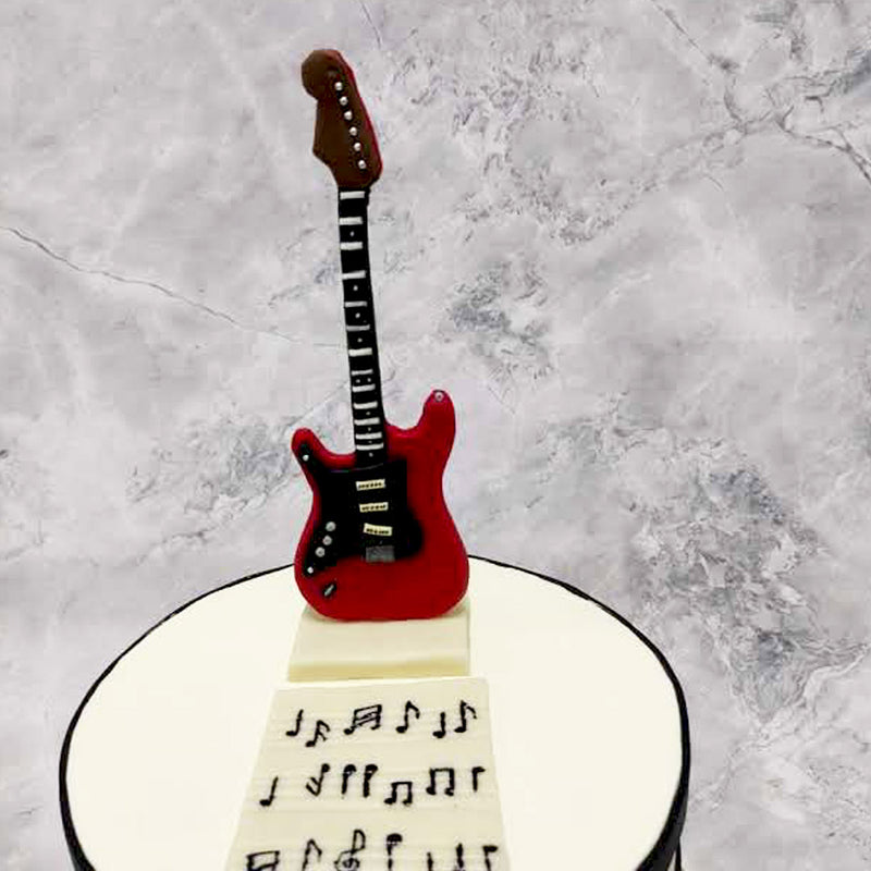 On your special day, as everyone sings to your tune, we aim to strum up the festivities with a guitar birthday cake that displays in an elegant and edible way, something that has captured the hearts of so many musicians from all over. If your son or daughter cannot get enough of this soulful instrument, then this is the cake for him / her.