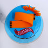 Top view of Hotwheels cake with Racing tracks and Hotwheels logo on top of the cake. A perfect birthday cake for boys  