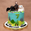 Front view of how to train your dragon cartoon cake where you can see the over all decoration of this dragon theme cake from mountain sceneries to three main characters of the movie