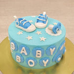 This blue theme cake for a baby is what one could call a "it's a boy cake" as it is perfect for a gender reveal. Nothing is more suited for a "welcome baby boy" cake than something as blue and delicious as this particular piece.