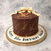 The logo of this global fashion company has been recreated in a two dimensional gold topping for this Louis Vuitton cake with the whole finish of it looking marbleized like the centerpiece at a gala.