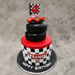 This Cars theme cake is inspired by the Pixar animation that has been stealing hearts since 2006. Lightning McQueen, the protagonist of the movie, is also the star of this McQueen car cake 