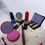 A lot of detailing went into this makeup cake design from the 'M.A.C.' labels to the lipsticks in every shade!  Even the bristles on the makeup brushes and the colours in the eyeshadow palette bring to life this birthday cake for mom  who is the most important woman in both our lives, often our style icons and fashionista-inspirations!