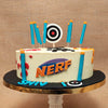 This kids birthday cake for him is crafted in a simplistic manner that replicates the playground where children would run around playing paintball or playing with toys, the neutral yellow buttercream on this nerf gun cake adds an extra element of colour to this vibrant aesthetic that creates the look and feel of the 90s, when the nerf gun first came out and gained popularity.