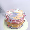 Multicolor cake with beautiful edible butterflies all around the cake. This Ombre cake has shades of three different colors which makes it called as Tricolour cake 