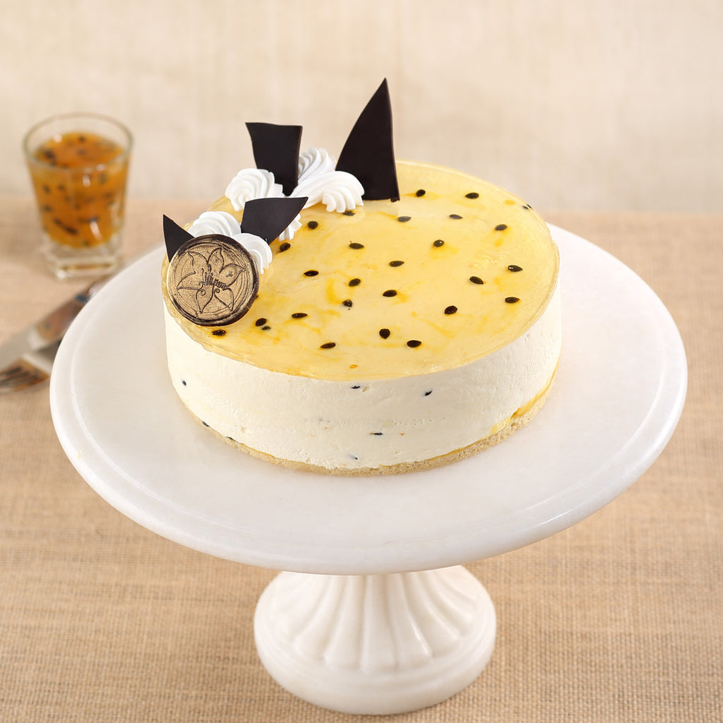 Passion Fruit Cheesecake is packed with tropical flavours and is the perfect dessert for any evening. This no bake cheesecake is just a delight to have., beautifully decorated with passion fruit compote on top of the cake and plus chocolate pieces adds more value to the cake. Simply the best cheesecake in bangalore 