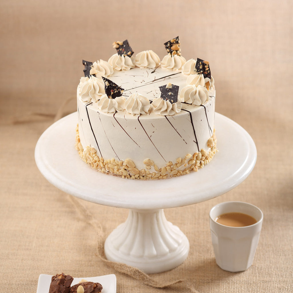 Peanut butter cake is dedicated to all those who likes peanuts a lot. This peanut butter jelly cake is mix of peanut and surprise jelly compote in between the layers of the cake. Order online peanut cake for same day delivery across Bangalore.