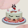 Front view of pet cake with a dog sitting on top of cats head. We are confused as if its is a cats cake or a dog cake because both of them are looking really cute in this pet theme cake