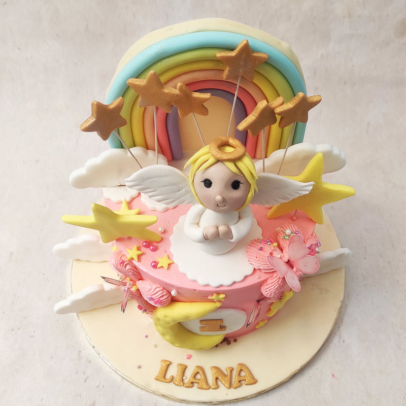 Spot these icons all over this birthday cake for girls such as the yellow crescent moon surrounding the age placard, the clouds, the yellow and gold stars embedded into the top like sparklers and even the beautiful three-dimensional rainbow 