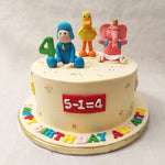 This Pocoyo birthday cake for kids features a creamy white base with a confetti rain of colourful sprinkles on it.