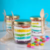 Rainbow jar cake with 5 different layers packed in a jar bottle that is why it is called as cake in a jar or jar bottle cake