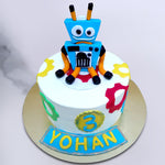 The robot in itself is blue and bears the expression of having gotten dizzy and fallen down. With limp orange and black limbs and antennas, this colourful creature looks as if he's fallen right on top of this robot cake for girls/boys.