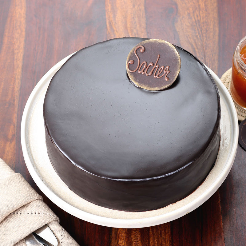 Top view of sacher torte cake or sacher cake which shows the classic finish of this dark chocolate cake
