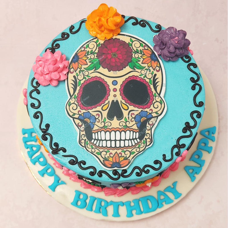  The colours and patterns used in this Dia De Los Muertos cake are the same ones associated with the occasion and if not as a statement piece to celebrate the death of loved ones, this Day Of The Dead skull cake could also double as birthday cake for him / birthday cake for her who loves the symbols embedded into this cake and the juxtaposition between life and death that it represents.