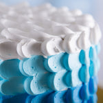 Zoomed image of Creamy Smash cake for baby first birthday cake. It haas soft cream layers and soft sponge in between which makes this Smash cake more special for babies first birthday celebration.