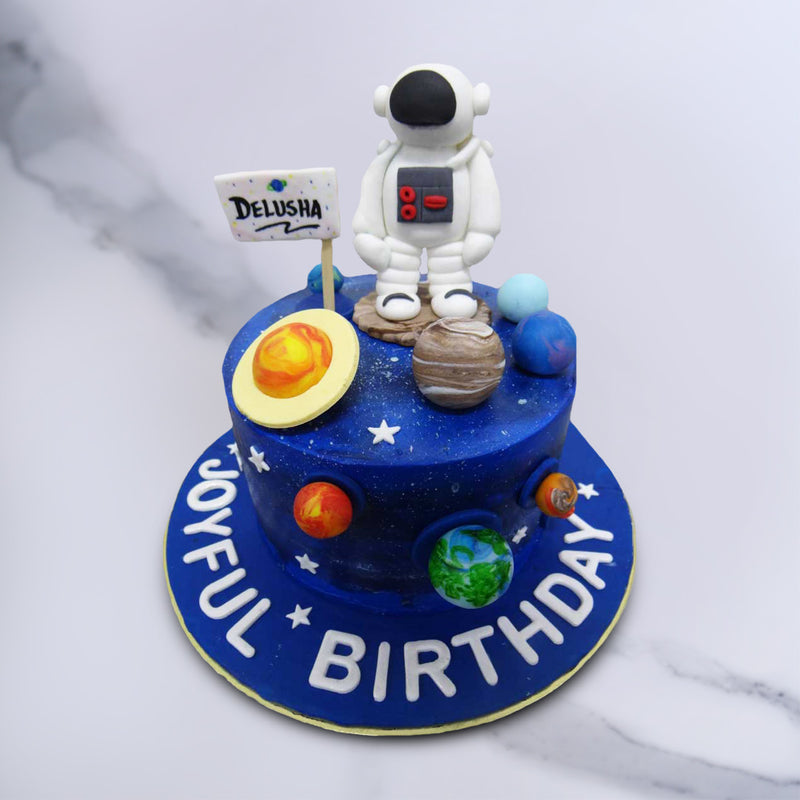 This space cake will make your wish on a shooting star come true! Let's take a journey to the stars and beyond with this astronaut themed cake.
