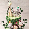 Spot the giraffe, elephant, zebra, lion and hippo happily seated on this animal themed cake.
