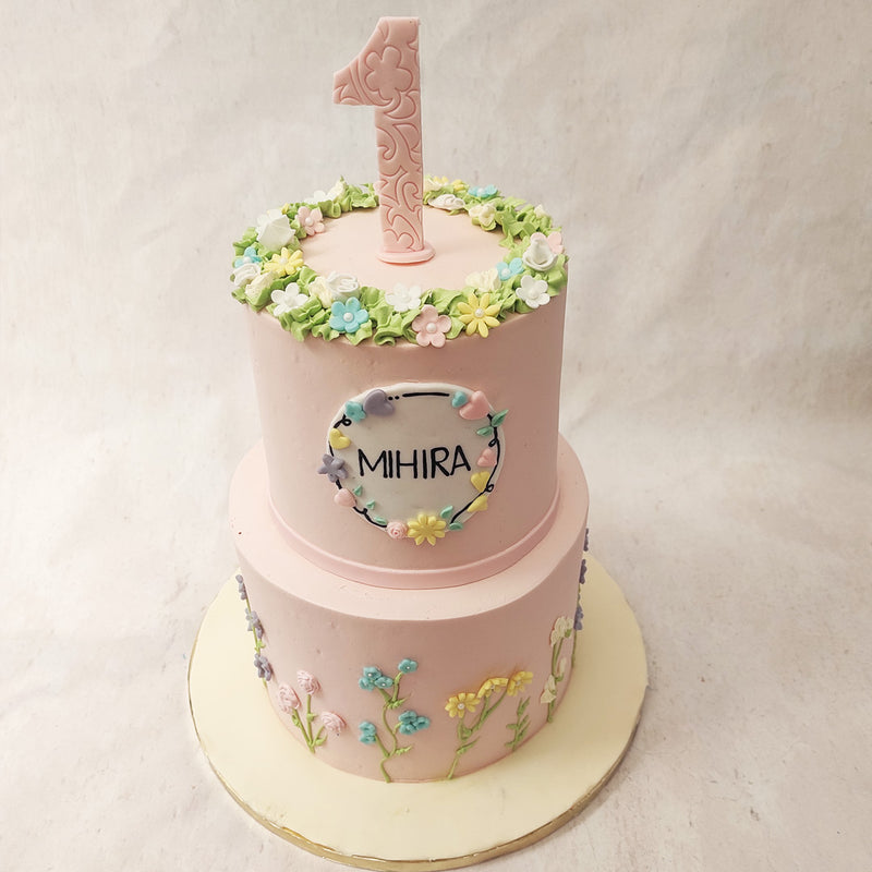  Pastel hues, pink aesthetics and pretty ornamentation, this pink flower cake is like a page out of every birthday girl's dream journal.
