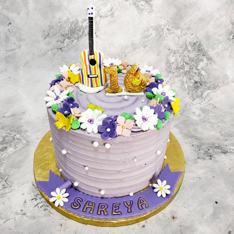 Like it was taken out of the set of a movie, this boho beauty is our famous Ukulele cake. Celebrate whimsically on a whim with this Ukulele cake that brings the joy of the great outdoors right to your doorstep.