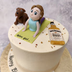 This yoga cake design would serve well as a birthday cake for wife as it captures all the elements of the modern day woman. From the edible figurine of the birthday girl on a green yoga mat doing the Cobra pose to the edible figurine of the dog. 