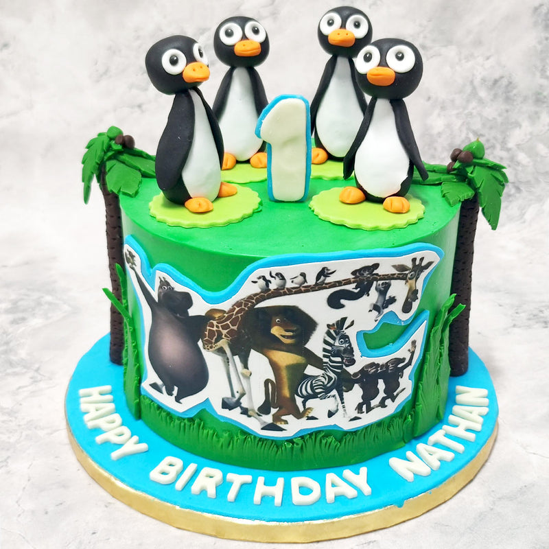 Just smile and wave boys because this Madagascar Penguin cake has traveled straight out of the movie to meet you and greet you on your special day