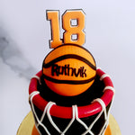 This basketball net cake design was originally designed for a true fan of all three: the player, the team and the game. So to pay homage to him and on this cake for him, we have a  jersey number displayed proudly on top. 