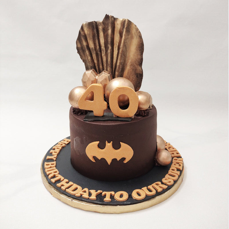 The Bat-signal is out and it’s alerting all Batman fans to celebrate their special day with this Batman birthday cake design. This Batman cake may not fight crime the way Batman does but it sure does fight those cravings! 