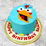 The game that once took the world by storm has spread its wings and taken flight into movies, merchandise and now into a customized, designer blue angry bird cake made just for you!