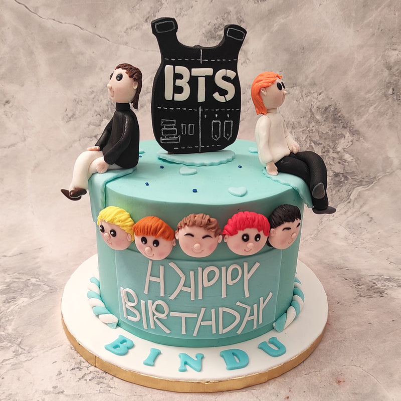  None of our cake designs pop quite like the K pop designs and on that note, we present to you this one of a kind BTS birthday cake. BTS stans are sure to understand why this BTS theme cake is true "important business".