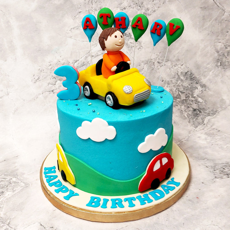 This car birthday cake for kids is a vibrant showpiece that captures all the colours of fantasy of childhood. This car theme cake is also a reminder to children that sometimes it's okay to have your head in the clouds because like this particular design showcases, that's where dreams come true.