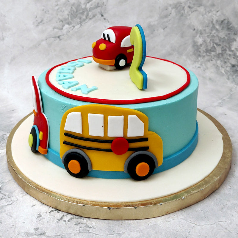 This is a car themed birthday cake design that is created using a lot of vibrant colours to add to the aesthetic of bringing to life a child's imagination.