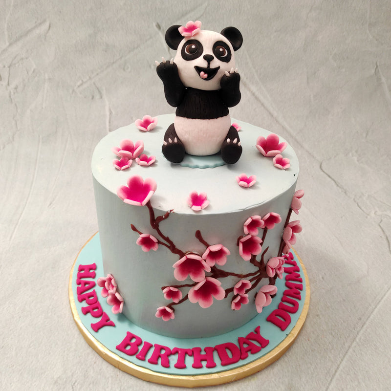 This cute panda birthday cake for kids is one of our most popular and 'aww'-inducing pieces. For the cute little one, here's a cute panda cake design to brighten up their day with a little black and white.