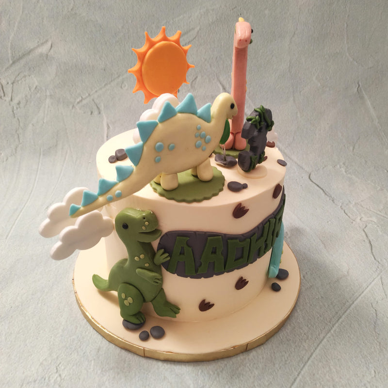 Embedded all over into the sides of this Dinosaur birthday cake for kids are thin, edible white clouds which make this design look like something either out of a movie set or like a miniature movie set itself.