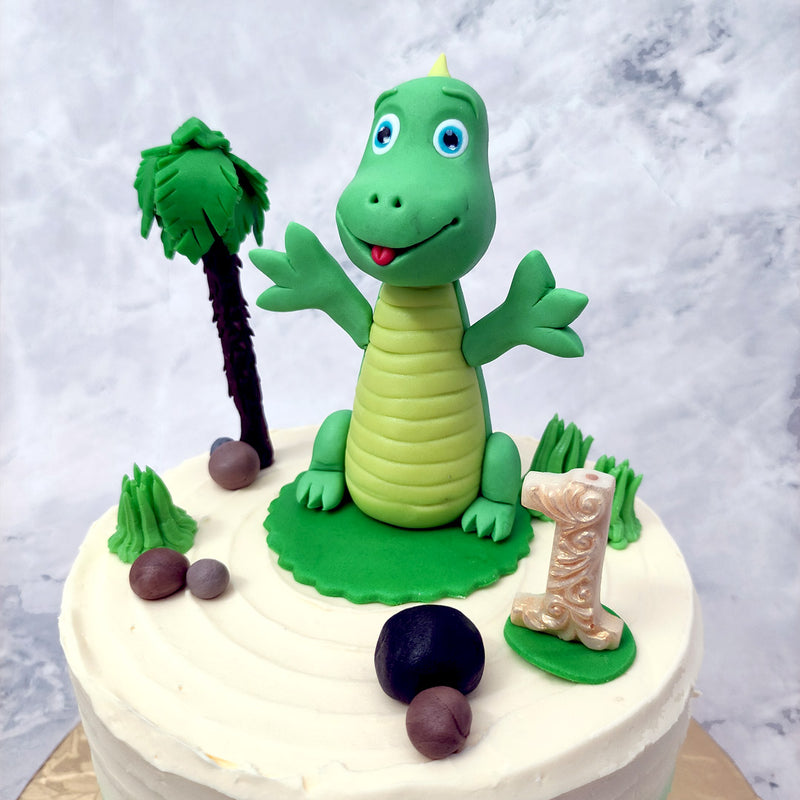 This green dino cake for kids is a delightful way to bring in the fun, frolic and festivities of a colourful island party that highlights all the elements of a bright, sunny day of celebrations.