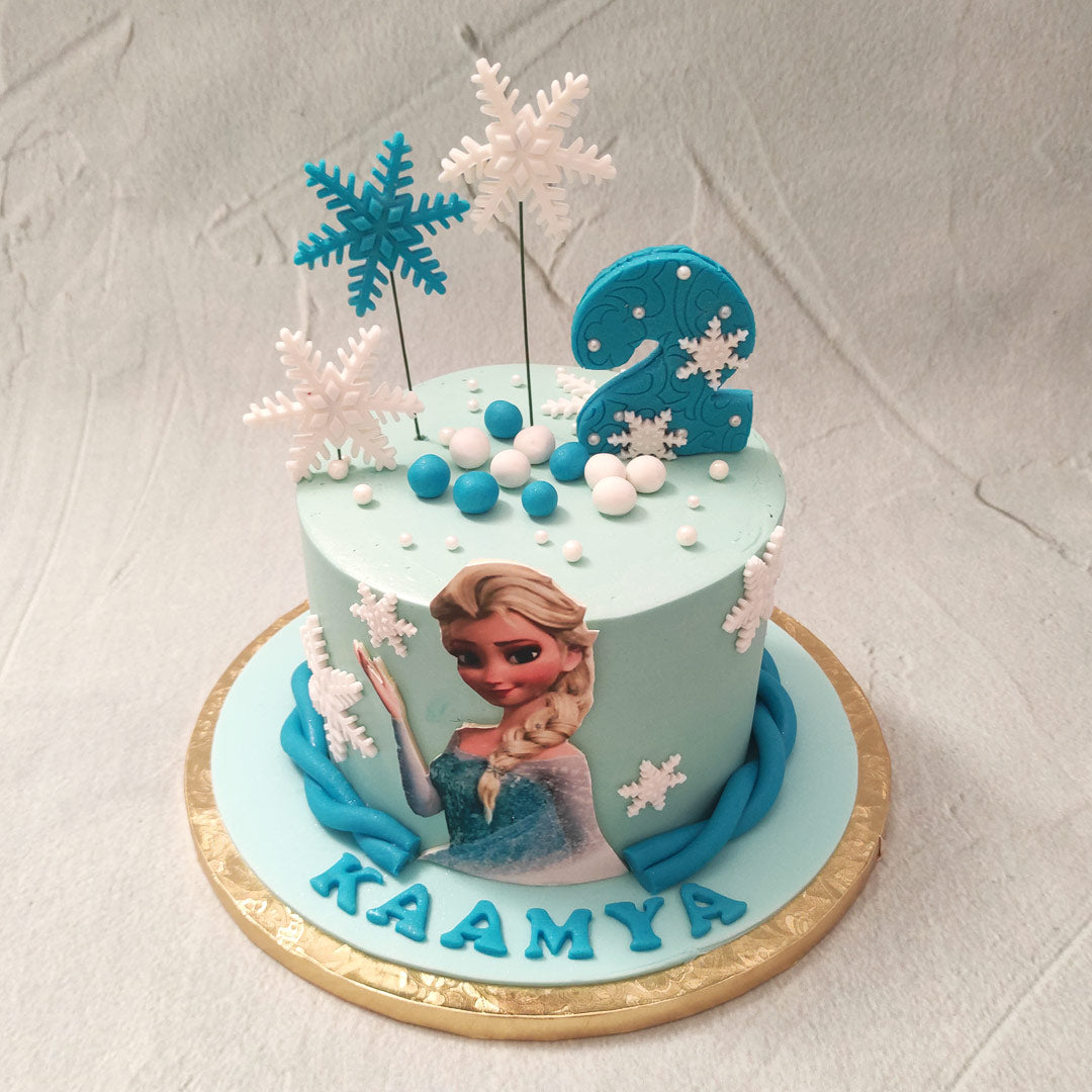 Frozen Elsa doll cake - Decorated Cake by Claire willmott - CakesDecor