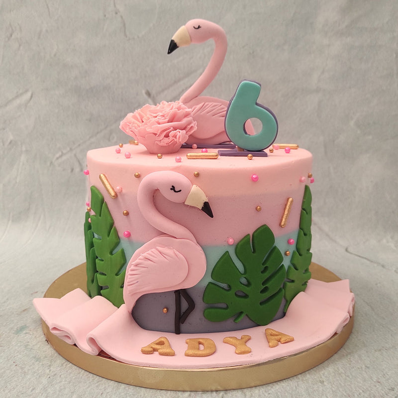 This tropical flamingo birthday cake is a tropical treat for all those who adore these majestic birds and all they symbolise. Here's a flamingo cake to ignite the pink tinted flames on your celebrations! 