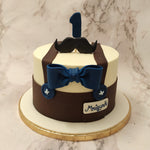 This gentleman theme cake is dressed to impress! The gentleman cake design is a play on the formal attire worn by a man with class and style.