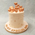 This golden heart cake or golden heart topper cake uses a simplistic yet artistic design meant to elevate your celebrations with a sprinkle of elegance and class.