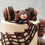Realistic and artistic, this headphone theme cake pays tribute to the things one might hold dear to their heart: the sound of music, a choco-bar or an old teddy bear we might have cuddled in our younger days. If there’s a special lady in your life, pay homage to the things of sentimental value to her with this headphones birthday cake for her.