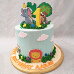 Like a happy picture painted on a nursery wall or in a children’s storybook, this safari jungle cake features a tall blue base depicting a clear sky on a perfect-weathered day. Fluffy white clouds can be spotted floating on by. Cartoonish animals of the jungle from a lion and zebra at the bottom to a monkey, giraffe and elephant on top grace the theme of this jungle safari cake design. 