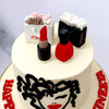 The base of this woman face cake comes in a shade of white that makes it look as if it's a canvas ready to be painted out with alluring, artistic expression and that's exactly what we've done with the abstract portrait of the lady with the curly hair and red lipstick on the side of this silhouette lady face cake design. 