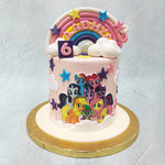 This My Little Pony cake design comes frosted in delicious, pink buttercream as light and as pastel as a little girl's nursery. Puffy, white clouds and colourful stars embellish the entirety of it, adding to the magical and celestial elements showcased in the series.