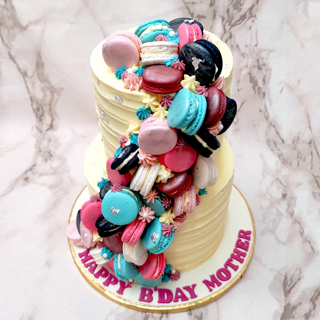 Lenka Sweet Dreams - Birthday cake with macarons and meringues. 🍬🎂  Colours are from Magic Colours and sprinkles from Cake Deco #birthdaycake  #meringues #macarons #sprinkles #buttercreamcake #dripcake | Facebook