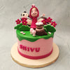 The top of this Masha cake is a picturesque recreation of the forest in which Masha lives with red and pink flowers, a tree stump displaying a birthday cake for kids and of course Masha and the bear themselves! 