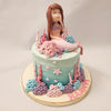 Coral, seaweed and starfish line the bottom of this mermaid theme cake in exotic pastel colours of pink, blue and purple, adding a feminine and embellished touch to the visuals.