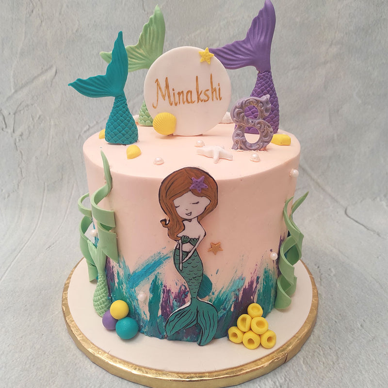  This mermaid tail cake design is taken straight out of a fairytale and placed on a platter into a delicious, creamy mermaid tail birthday cake for kids to bring joy to their eyes, heart and taste buds!