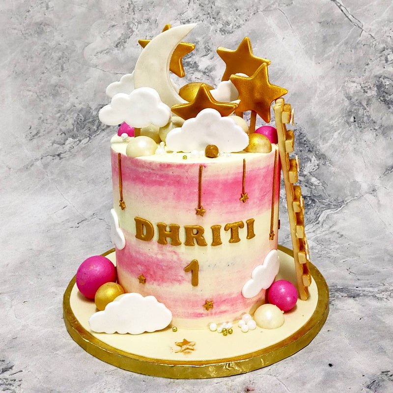 This pink moon and stars cake will make sure that by the end of your celebrations, you will be over the moon. We didn't just aim for the stars with these moon and stars cake, we made sure we could bring them to your doorstep.
