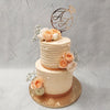 This peach floral two tier cake is an edible work of art, made to bring joy to the tastebuds, eyes and the heart. This peach floral cake design is symbolic of affections as sweet as frosting! 
