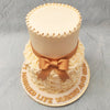 This rosette two tier cake features a clean, white finish as the top tier with the entire bottom tier covered in piped buttercream roses, swirling in drool-worthy spirals that will just melt in your mouth. 